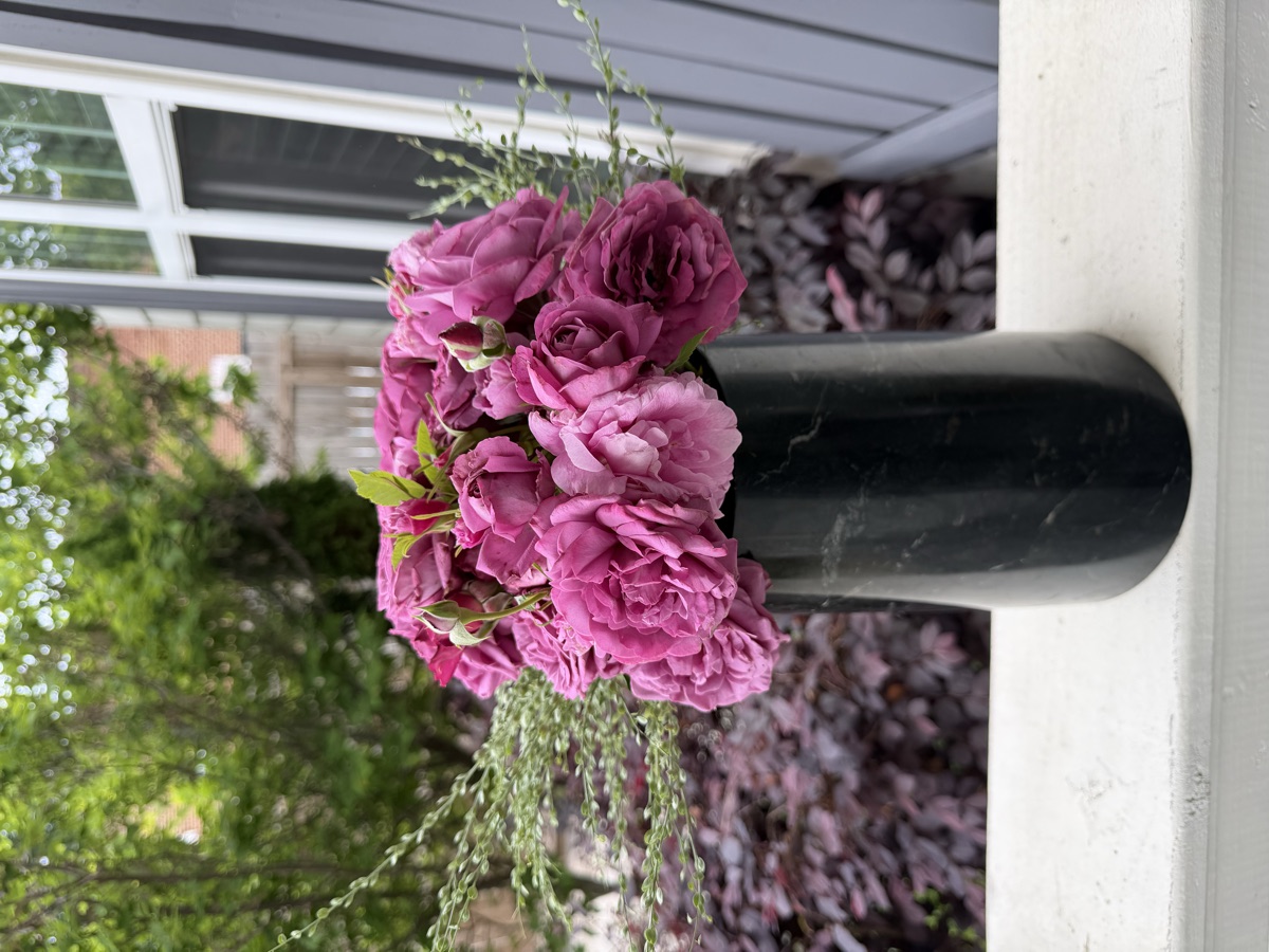 Spring flower arrangement with pink roses