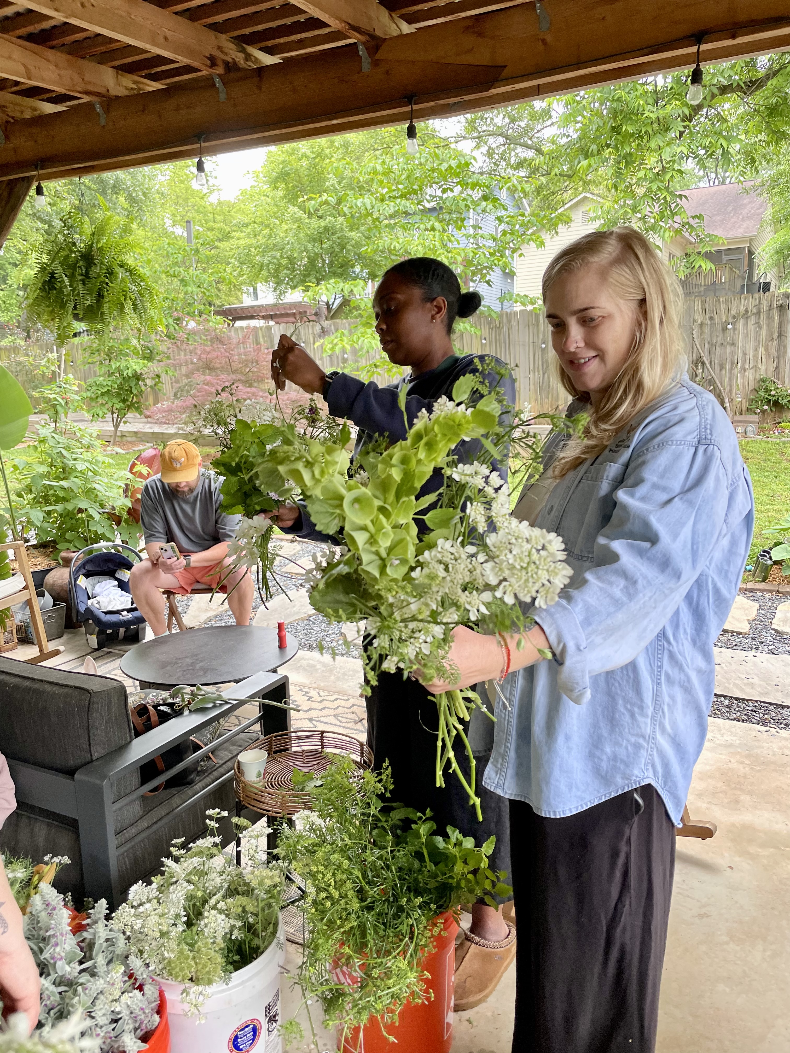 Arranging fresh-cut flowers and foliage